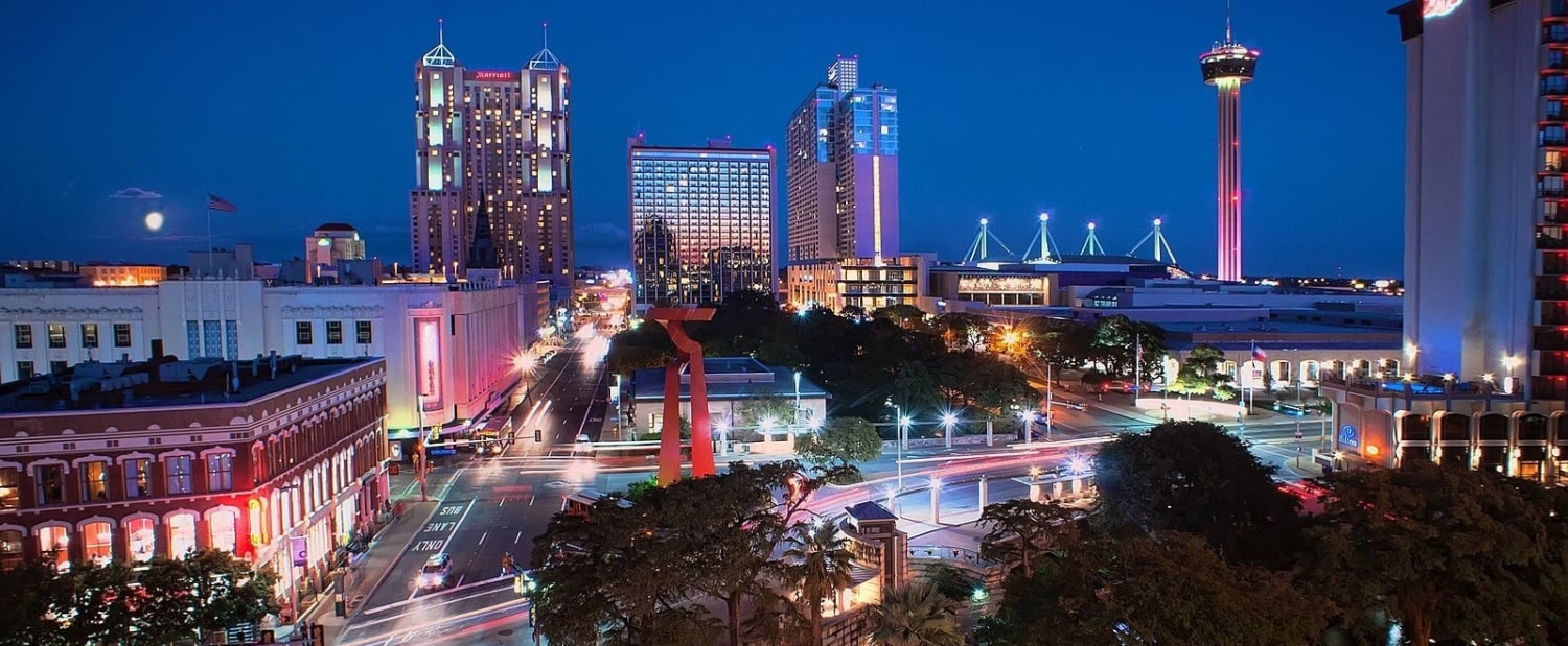 San Antonio building and streets at night.