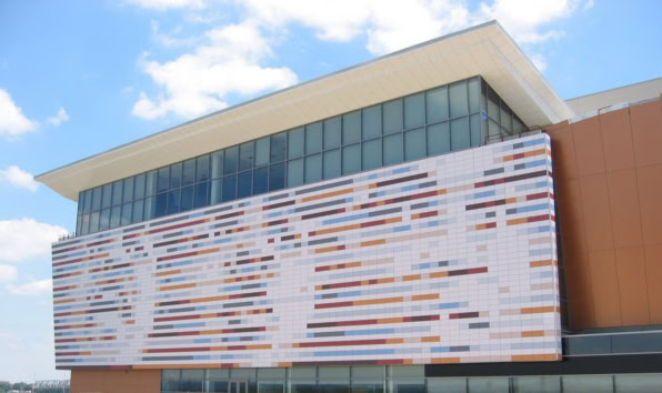 Side of the Muhammad Ali Center building with mosaic tiling featuring Muhammad Ali imagery